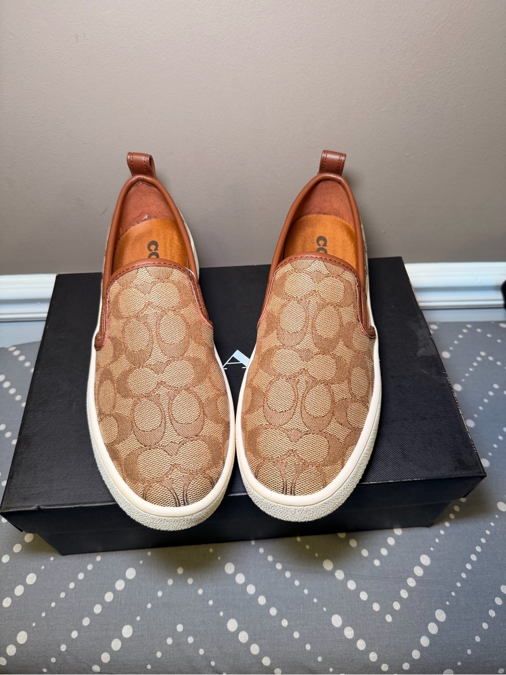 Coach Women’s Brown Signature Slip-On Sneakers